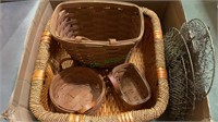 Box of Longaberger baskets and other baskets.