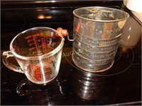Pyrex 2-c glass measuring cup, metal flour sifter