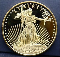 8oz Liberty silver round w/ 24k gold overlay