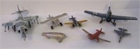 Lot that includes die cast cast airplanes. They