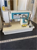 Dressmaker suitcase sewing machine