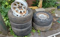 4 TRAILER WHEELS - ONE RIM AND 2 MISCELLANEOUS