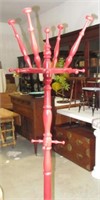 RED PAINTED WOOD COAT RACK 16"DIA BY 67"HIGH.