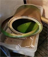 Tote of ceramic tile and metal watering can