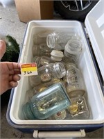 Cooler with jars, items on cooler