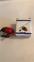 Red close face fishing reel