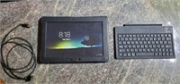 Asus TF300T tablet with Bluetooth keyboard.