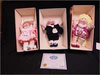 Three porcelain Cabbage Patch dolls by