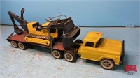 Metal tandem axle truck with flat deck and Tonka