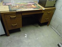 PRESSED WOOD DESK, LOCATED IN BASEMENT