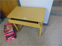 SMALL TABLE WITH DRAWER LOCATED IN BASEMENT