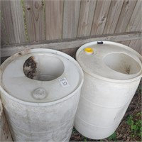 4 WHITE PLASTIC BARRELS WITH TOPS CUT OUT