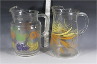 Two VTG glass pitchers