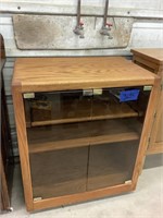 Cabinet with glass doors and pull out shelf