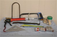 Two coping saws, hacksaw, nail puller, tape