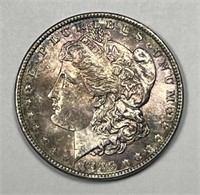 1886 Morgan Silver $1 Toned Obv. Uncirculated BU