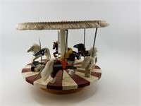 Wooden Carousel, in need of repair.  8" tall.