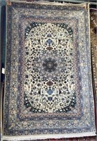 6' x 8' 10" Beige Tabriz Rug.