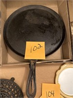 cast-iron pan marked number eight
