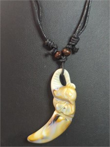 Hand carved bone elephant tooth necklace