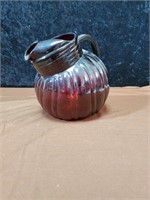Ruby glass pitcher approx 7 inches tall