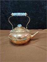 Copper kettle with blue & white handle