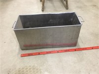 Stainless steel rectangular bucket.  (Somewhat