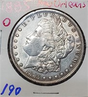 1885 O Morgan US silver dollar New Orleans AU-UNC