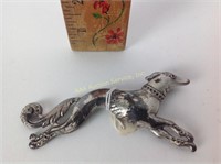 Large greyhound brooch - finish wear and