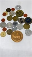 Group of older and newer medallion tokens