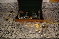 412: set of gold colored silverware service for 8