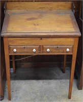Oak lift top writing desk with double drawers and