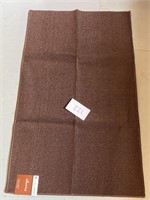 Brown accent rug - new