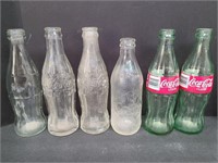 Five Old Pop Bottles
