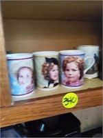 SHELF OF COLLECTOR CUPS
