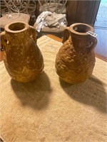 2- orangish ceramic planters