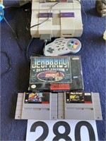 Super Nintendo w/games and controler
