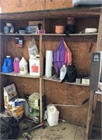 Contents on wood shelf: pots & plastic tubs