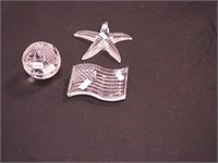 Three Waterford crystal paperweights: flag,