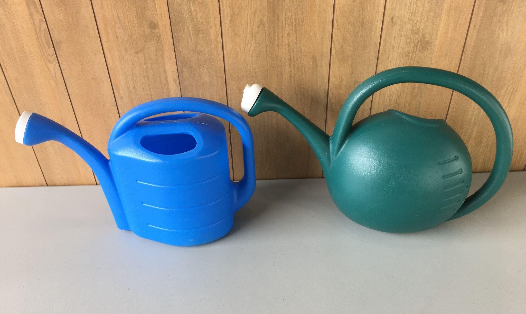 2 Plastic Watering Cans
