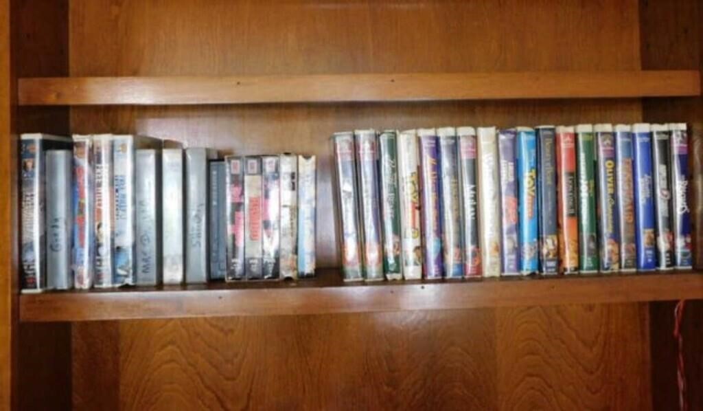 32 VHS movie tapes: Walt Disney & Warner Bros.