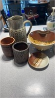 Handmade pottery pieces, pitcher, cups, bowls