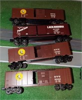 (4) Lionel train cars including NYC and