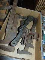 Primitive pipe wrenches