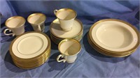 28 pieces of gold encrusted china, sorta matches