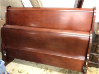 Mahogany colored queen size sleigh bed