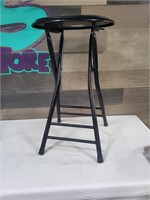 Black folding stool