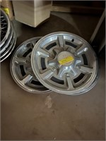 (3) 16" GMC hubcaps