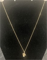 Ladies 10k gold necklace w/ pendant.