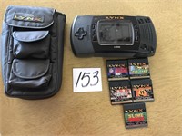 ATARI LYNX SYSTEM W/ GAMES IN CARRY CASE